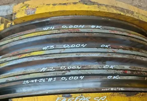 Las cuatro poleas del bloque viajero, medidas y marcadas 0,004 OK